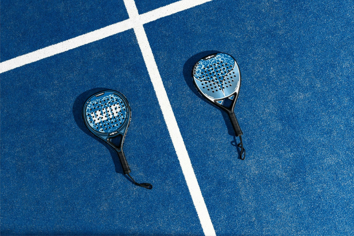 Stock placeholder: two padel rackets on a court
